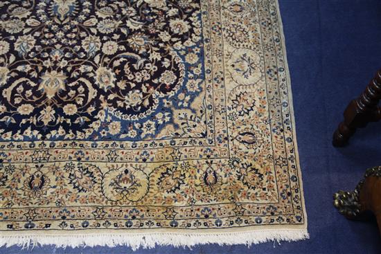 An Isfahan carpet, 8ft 4in by 4ft 8in.